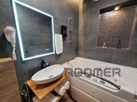 Jacuzzi, sauna, round bed, fireplace., Krasnoyarsk - apartment by the day
