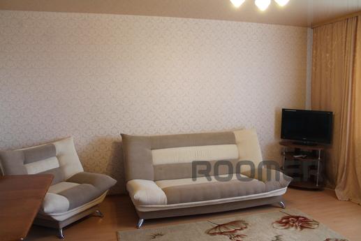 The apartment is in the center of the city. Near shopping ce