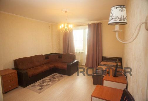 Large, modern apartment. The room has a double sofa bed and 