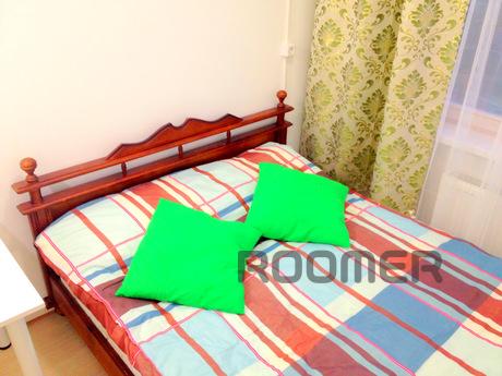 Bright small apartment for daily rent in a modern house in K