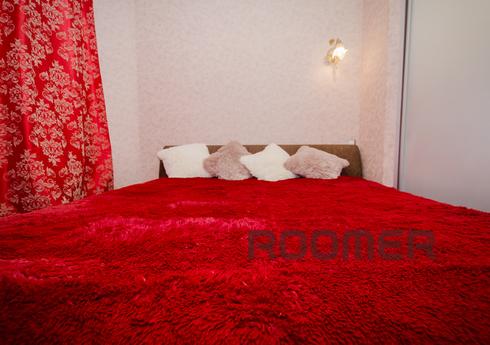 The apartment is located in a new building with fenced yard,