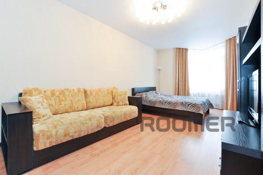 Marin Dom na Bazhova 68, Yekaterinburg - apartment by the day