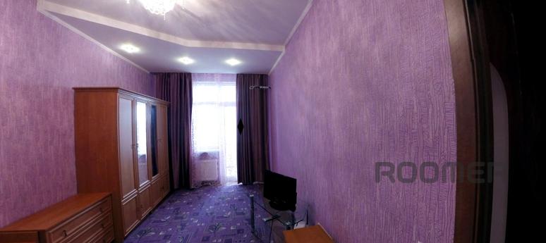 The apartment is in a new building near the bus, tram, from 