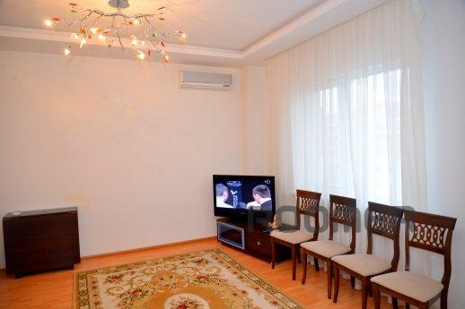 Daily rent a cozy two-bedroom apartment in the heart of the 