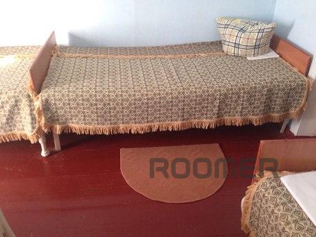 There are 4 bedrooms, separate kitchen from the owners, a su