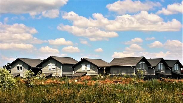 The new two-storey wooden house for a comfortable family hol