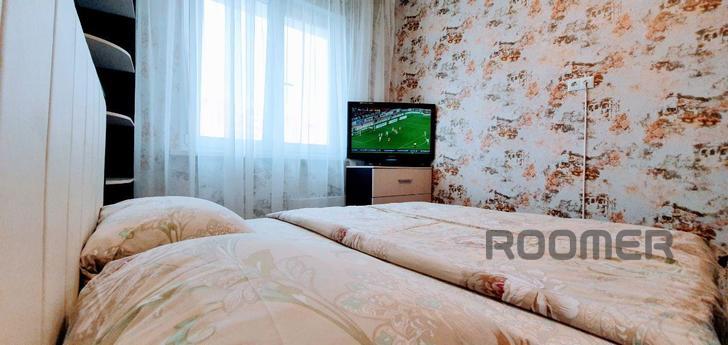 Apartment for rent on Usoltseva 26 AURA, Surgut - apartment by the day
