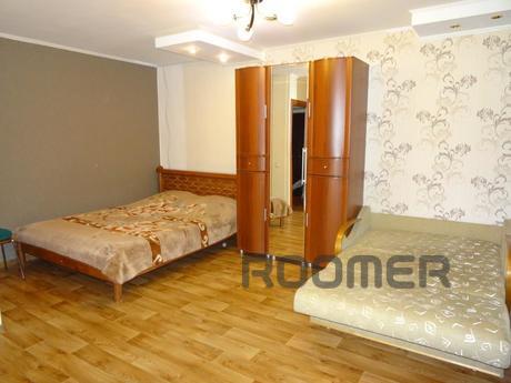 Night, clock, day in a cozy comfortable apartment, located i