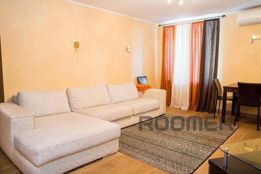 One bedroom apartment with designer renovated, in a brick ho