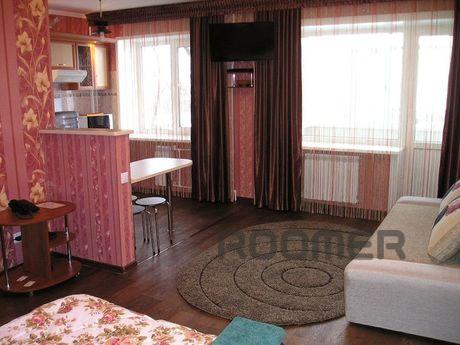 The apartment: Bedroom: a large mirror double bed, sofa, cof