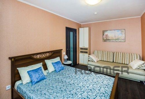 The apartment is located in a new brick house with a closed 