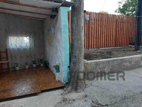 1kkv with a courtyard in the village Sun, Yalta - apartment by the day