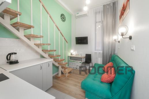 The apartment is located in the Tagansky district in the Lof