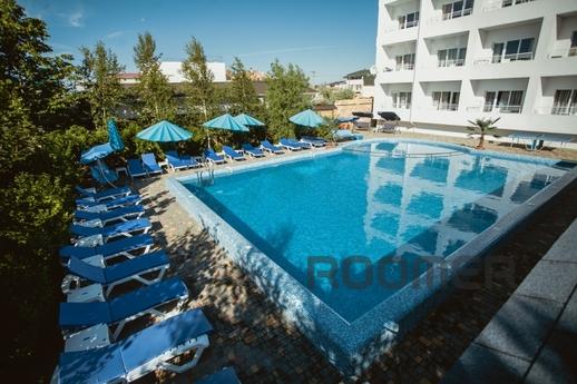 Villa Santorini is a small family hotel in Zatoka, Karolino-