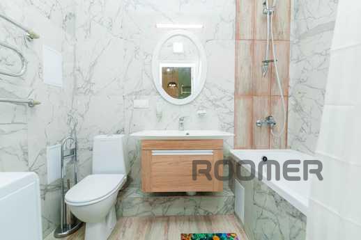 Great apartment in the center of the lef, Astana - apartment by the day