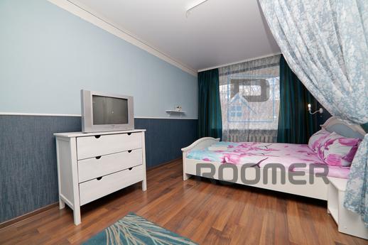 The apartment is located in the heart of the city, at the in