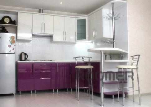 The apartment is located in the heart of the city, overlooks