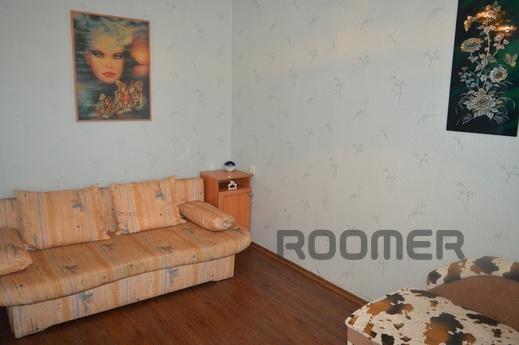 Cozy one-room hotel: furniture, appliances. kitchen and bedd