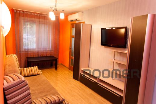 The house is located in the city center, with well-groomed l